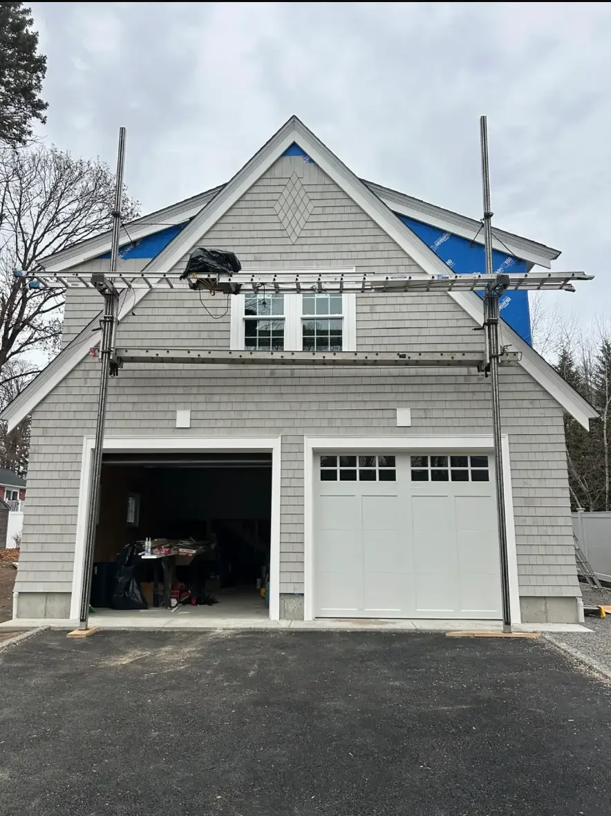 Garage with new siding and doors