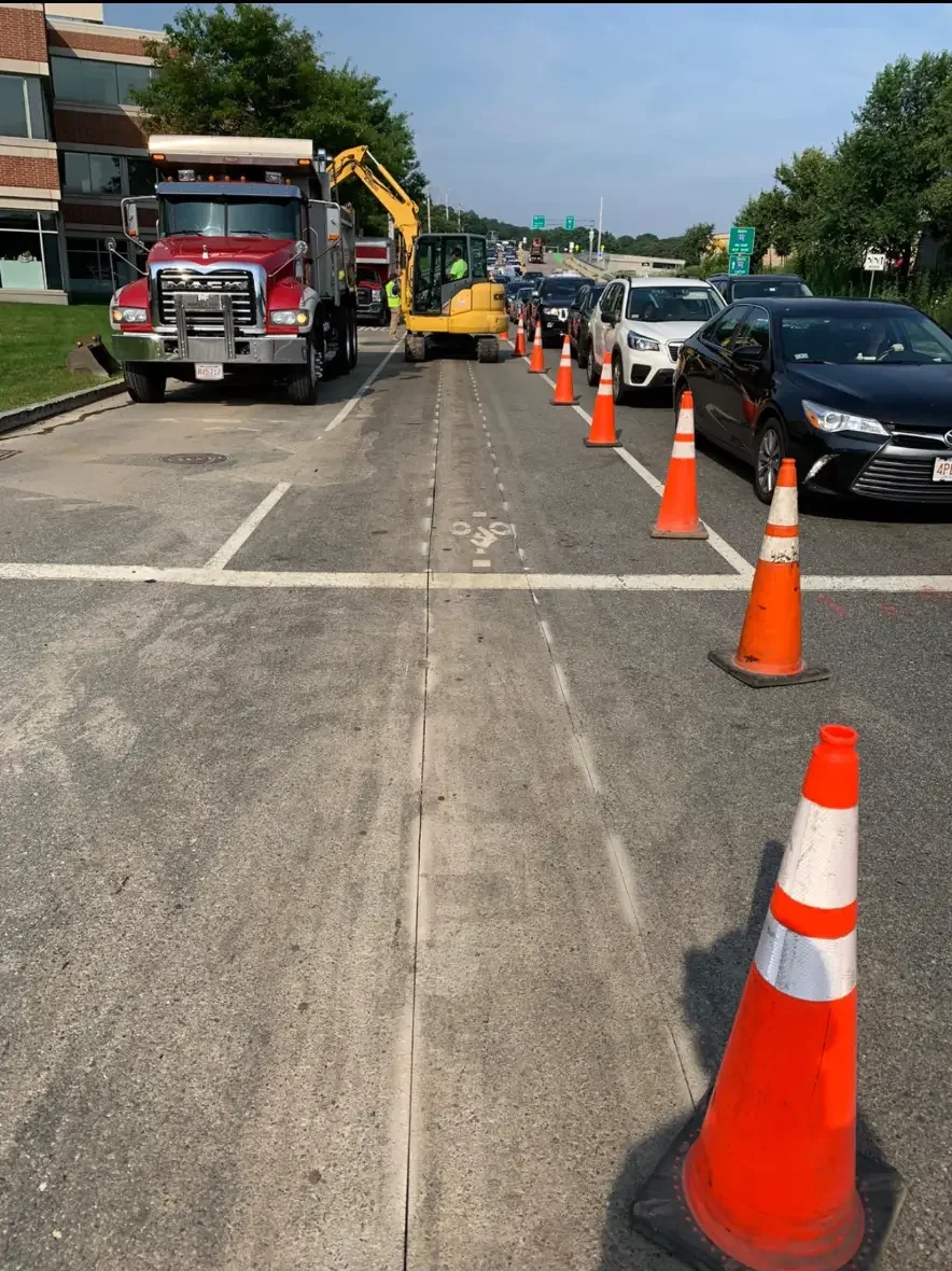 Public works road construction with equipment